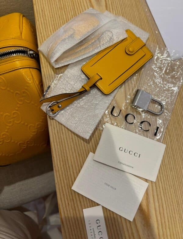 Gucci Embossed Yellow GG Duffle Bag - Image 6